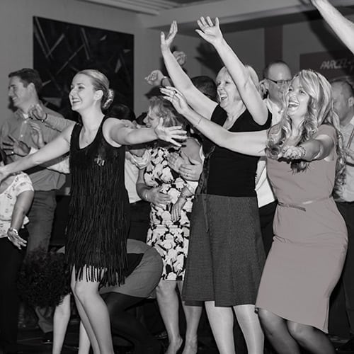 Corporate team dancing